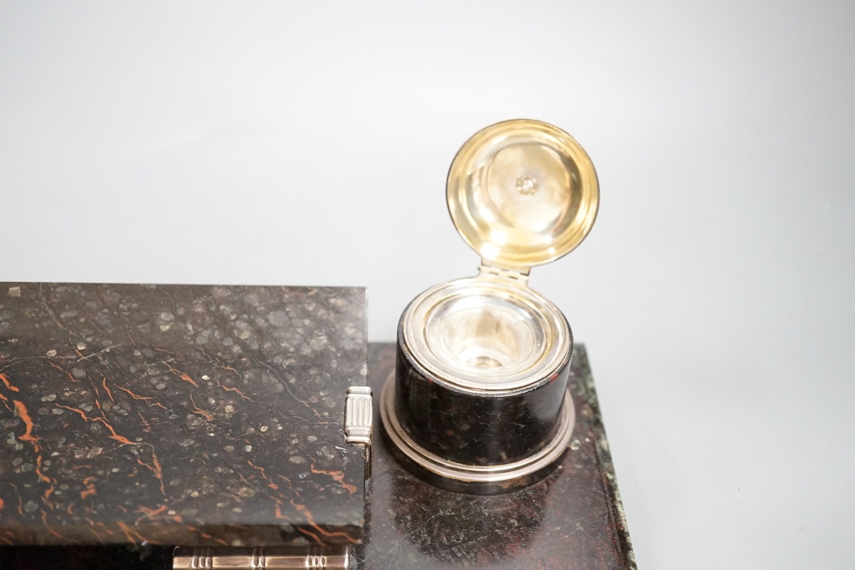 A stylish Art Deco silver mounted polished serpentine desk set, c.1930 by Robert Linzeler